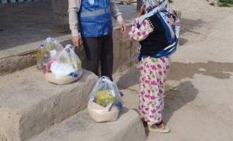 توزیع کمک های مومنانه عوامل و زائرین کاروان 38063 شهرستان گنبد کاووس 