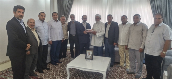 به مناسبت گرامیداشت هفته دفاع مقدس ، دیدار با خانواده شهید منا در شهرستان گنبد کاووس /غبارروبی و عطر افشانی از گلزار شهدا 